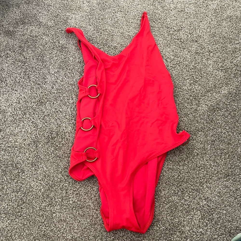 Aerie red one piece with holes in the side! Large